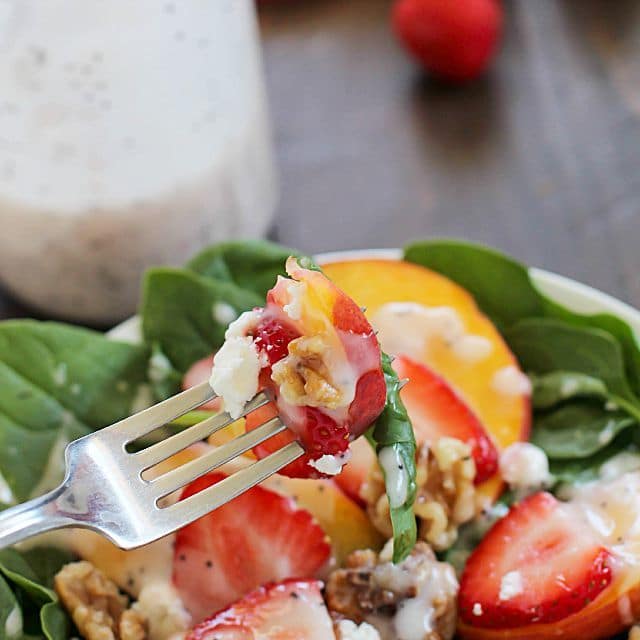 Spinach Salad with strawberries, peaches, candied walnuts, goat cheese and a crazy good (and crazy easy) homemade poppyseed dressing! PLUS a Blendtec Giveaway!