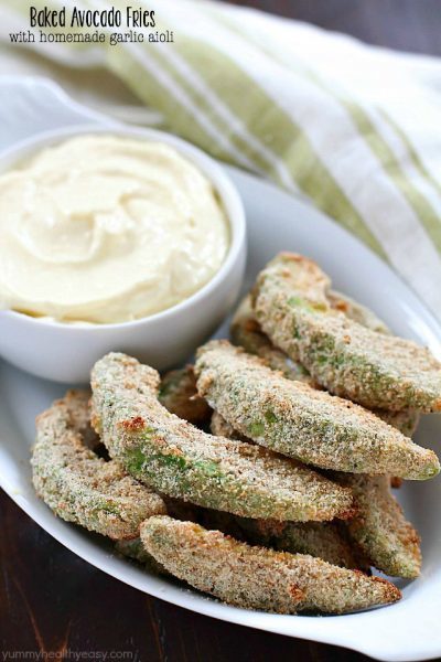 Baked Avocado Fries - these are incredible! Dip them in a homemade garlic aioli and you'll be in heaven. All dairy-free and delicious, must-make healthy recipes! #MeatlessMondayNight