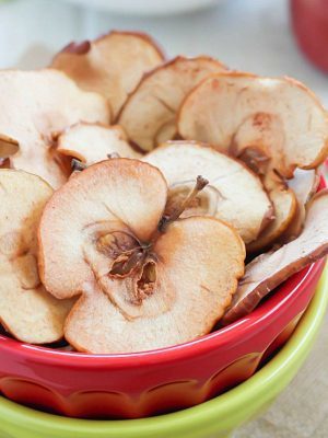These Homemade Apple Chips are the perfect healthy snack for any time of the day! They're easy to make and you only need a few ingredients to make them. One of my favorite healthy snacks! (P.S. No dehydrator needed!)