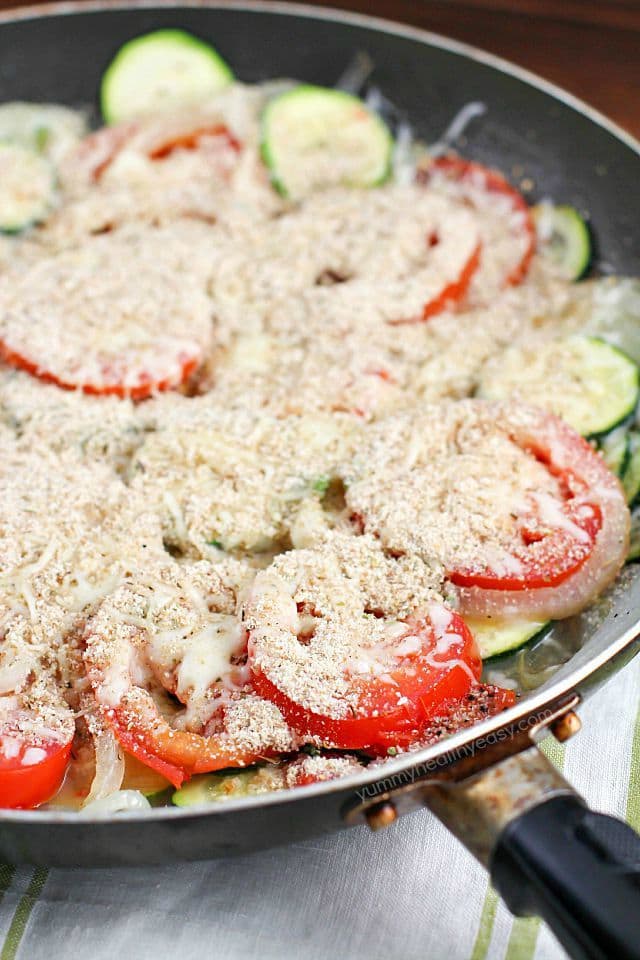 No better way to use up that summer zucchini than in a healthy and easy side dish! This Tomato Zucchini Skillet is made in one pan and kicks the pants off those frozen veggie side dishes!