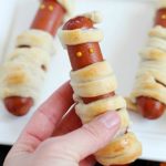 Looking for a fun, kid-friendly dinner for Halloween? Make these Hot Dog Mummies aka Mummy Dogs! A super cute and really easy recipe with only two main ingredients!