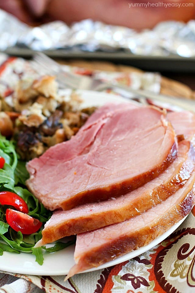 The juiciest, most tender Brown Sugar Glazed Ham ever and it's SO easy! Only a few simple ingredients to an incredible ham that will be a hit at your next holiday party!