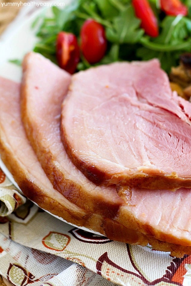 The juiciest, most tender Brown Sugar Glazed Ham ever and it's SO easy! Only a few simple ingredients to an incredible ham that will be a hit at your next holiday party!