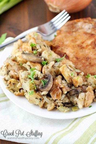 So many great spices & flavors going on in this Crock Pot Stuffing Recipe! It beats the pants off of those other blah stuffing recipes. Plus it's cooked in the slow cooker, so you can put it in hours before dinnertime and not even think about it until you eat! Perfect for Thanksgiving or any other day of the year!