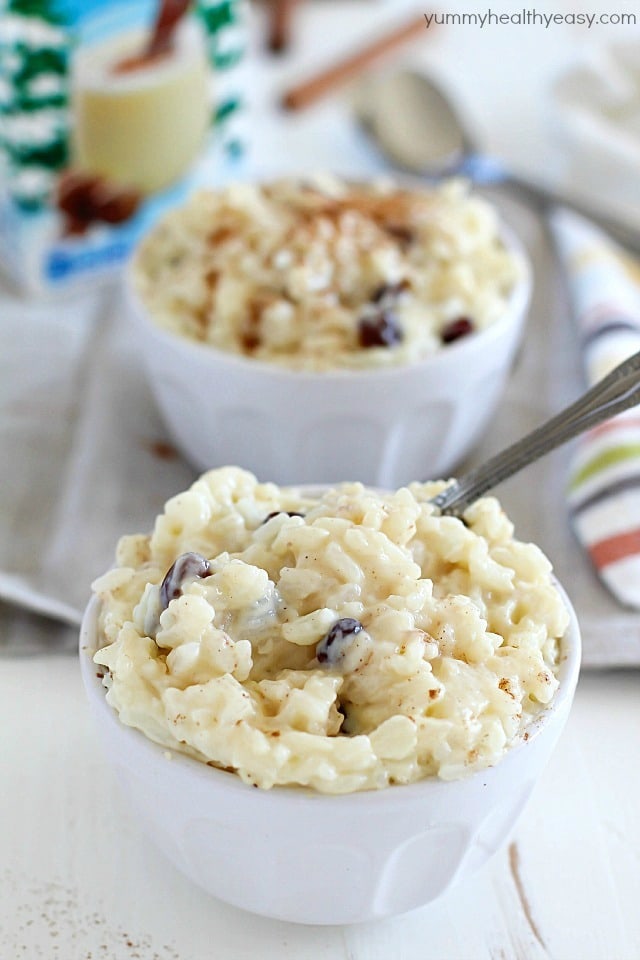 This delicious and creamy Eggnog Rice Pudding recipe will have you ready for the holidays! The textures in this rice pudding will wow your tastebuds. The rice is tender, the raisins are chewy and the pudding part is so creamy. Add in eggnog flavor and it's like heaven in your mouth. #AD