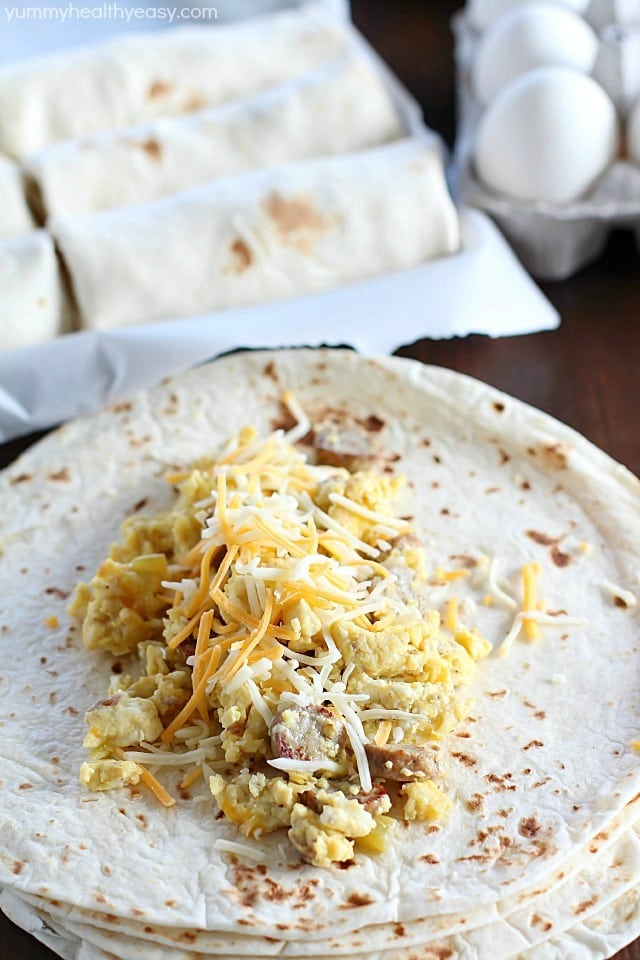 Freezer Breakfast Burritos are the best breakfast for busy people! Fix up a batch (so easy!) and throw in the freezer. When you're rushed to get out the door in the morning, throw a freezer breakfast burrito in the microwave and you're out the door with a healthy breakfast in minutes! AD