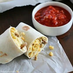 Freezer Breakfast Burritos are the best breakfast for busy people! Fix up a batch (so easy!) and throw in the freezer. When you're rushed to get out the door in the morning, throw a freezer breakfast burrito in the microwave and you're out the door with a healthy breakfast in minutes!
