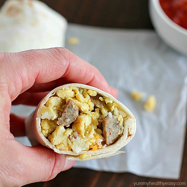Freezer Breakfast Burritos are the best breakfast for busy people! Fix up a batch (so easy!) and throw in the freezer. When you're rushed to get out the door in the morning, throw a freezer breakfast burrito in the microwave and you're out the door with a healthy breakfast in minutes! 