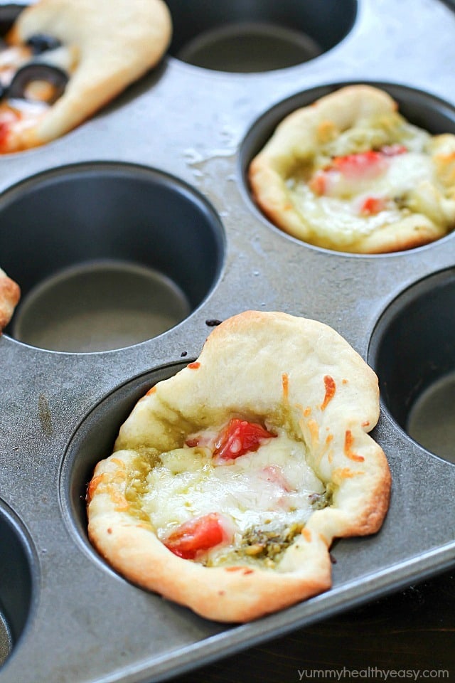 Dinner doesn't get easier than this: Easy Muffin Tin Mini Pizzas! They're ready in about 20 minutes and are customizable to what you like. Kids love these and love to help make them!