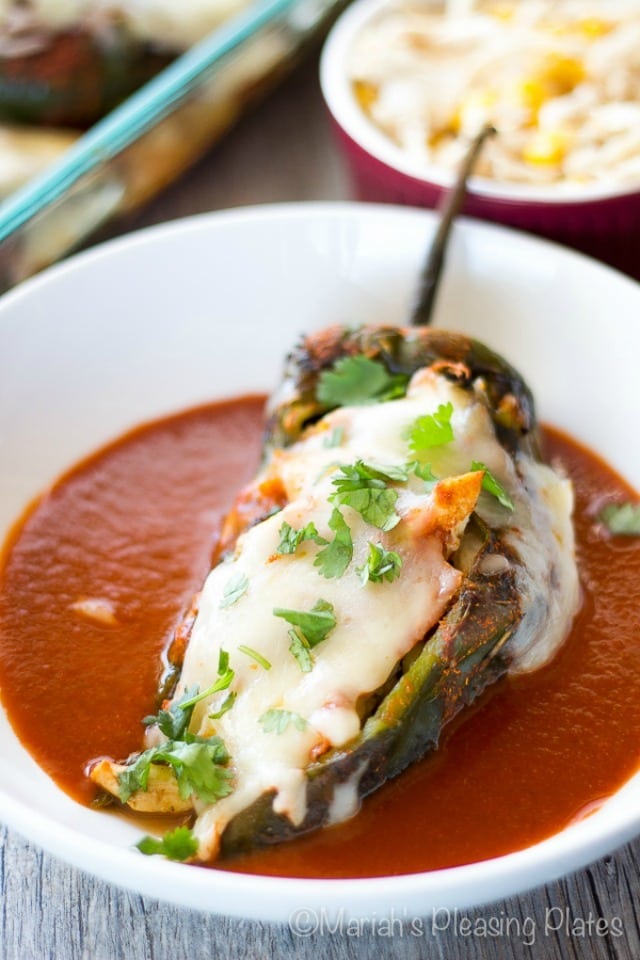 These Skinny Chicken Enchilada Stuffed Chilies have all of the flavor and none of the guilt. Zesty enchilada flavors are merged with the classic chile relleno to make this a dinner you won’t soon forget. 
