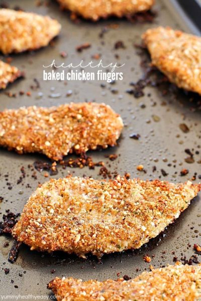 Healthy Baked Chicken Fingers with an almond-herb crust. These are my go-to easy dinner idea and my favorite way to eat chicken! They're incredibly flavorful and delicious! AD