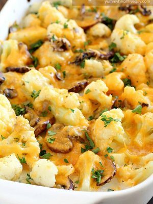 Cheesy Cauliflower Casserole makes the most delicious side dish or meatless main dish! Full of flavor with cauliflower, sautéed mushrooms & leeks, and an easy cheesy sauce that won't pack on the calories. This is incredible! AD