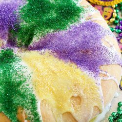 Have you ever made a King Cake for Mardi Gras? It's a fun, colorful cake to serve at a Mardi Gras celebration - or for any occasion because it's absolutely delicious!