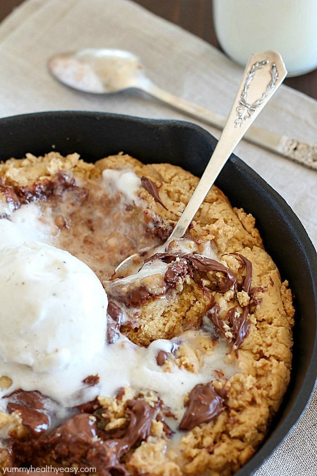 How about a Skillet Cookie with a Nutella Swirl for dessert? Yes! A warm, lightened-up cookie with a Nutella swirl & a scoop of low-fat ice cream on top + a spoon! Just like a "pizookie" at your favorite restaurant! PLUS 23 more amazing Nutella recipes that will have your mouth watering!