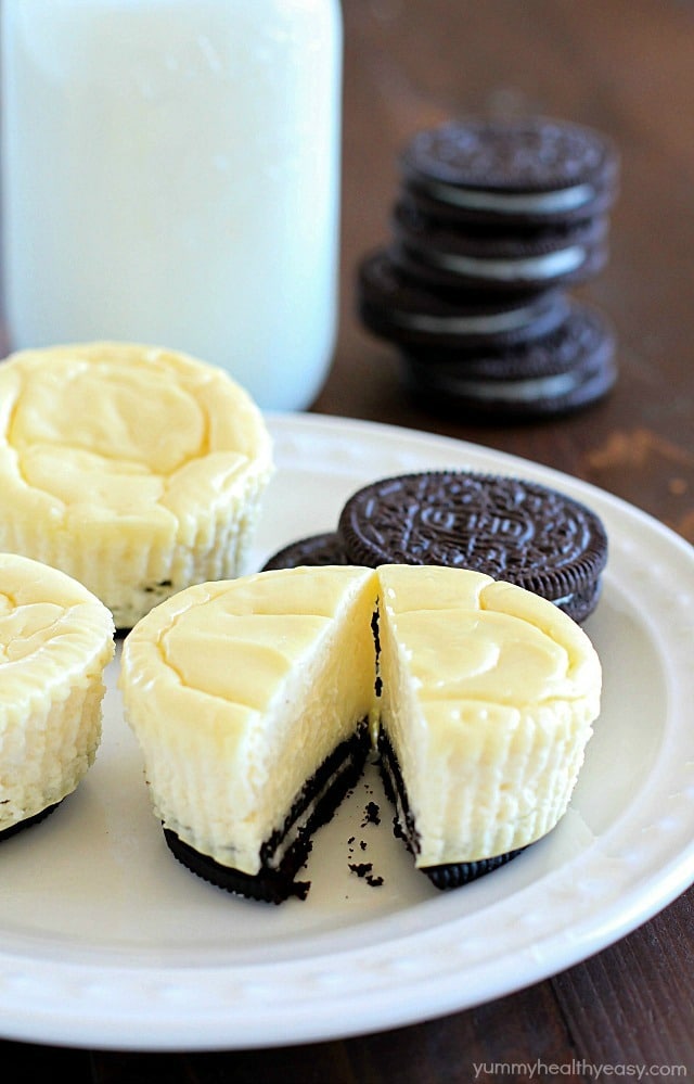 Mini Cheesecakes with an Oreo crust! This lighter recipe is absolutely delicious and super easy to make. Only a few ingredients & whipped up in a matter of minutes. With less calories than a regular cheesecake + built-in portion control with the muffin tin! These are a dessert worthy of guests or just for fun!