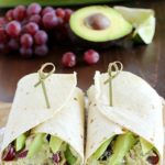 Avocado Chicken Salad Wrap - a perfect blend of avocado, Greek yogurt, chicken, celery, grapes, red onion & spices to make your lunch complete! This is healthy and only takes a few minutes to whip up!