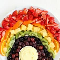 How about making a FUN Fruit Rainbow with Lemon Dip?! It will be the hit of your party! Whether you're celebrating St. Patrick's Day or just any day of the week, this is a snack everyone will enjoy! The Lemon Dip is so creamy and delicious. It goes perfectly with the fruit!