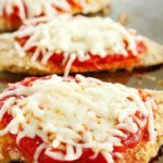 Time to change up that fattening Chicken Parmesan Recipe and make it skinny!! This lightened up comfort food dish is super easy to make and made healthier by baking instead of frying among other things. You need to add this Skinny Chicken Parmesan to your weekly dinner rotation!