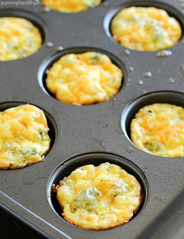 Egg Breakfast Muffins that are full of kale, potato, egg and topped with cheese. Mini, kid-friendly, easy to make, and quick to reheat for a breakfast on the go! AD