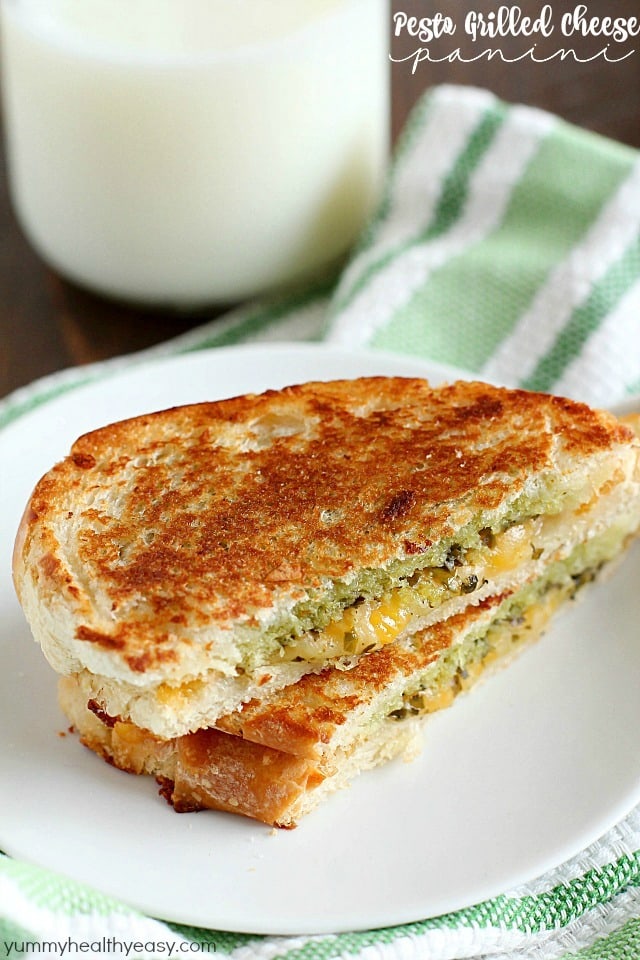 Pesto Grilled Cheese Panini is the easiest and tastiest grilled cheese sandwich pressed with two pans to make it a panini! You only need a few ingredients for this delicious sandwich full of flavor!