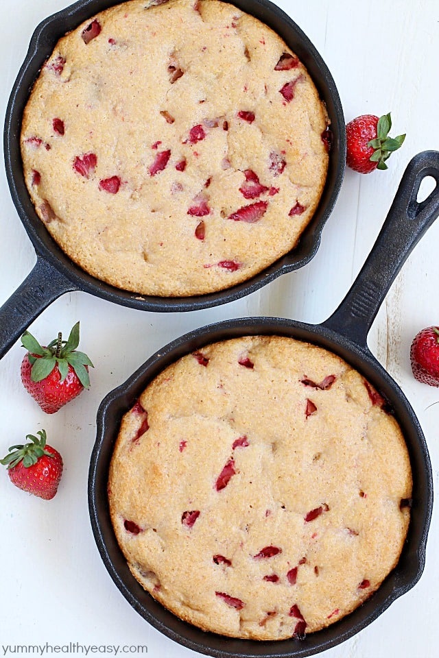 This Strawberry Skillet Corn Cake is full of strawberry goodness! It's super easy to make, with only a few ingredients and absolutely perfect to serve for brunch, dessert or a fun snack!