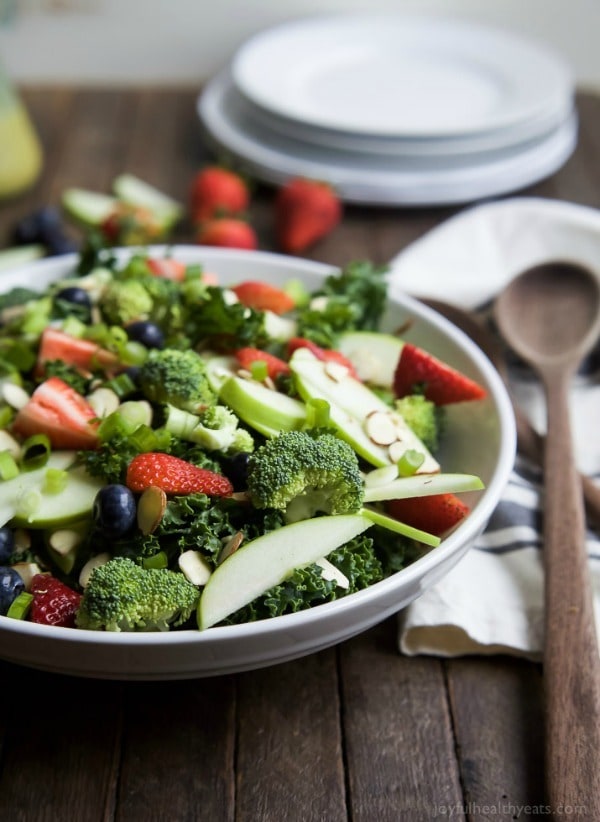 A super healthy Detox Summer Salad filled with kale, broccoli, fresh berries, and almonds then topped with a “lick your plate” worthy Citrus Basil Vinaigrette! This salad is great for lunch or the perfect side to bring to your next BBQ!