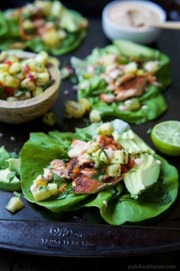 The perfect healthy twist on the original fish tacos! These Southwestern Grilled Salmon Tacos are bursting with flavor and topped with fresh pineapple salsa and a Chipotle Lime Crema! Addicting!