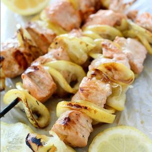 Salmon Skewers tossed in a garlic-lemon sauce and then grilled. So simple and so flavorful! Salmon and citrus is combined to create the result of a crazy delicious, tender, lemony salmon that is like heaven on a stick!