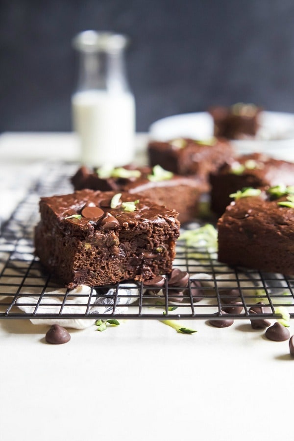 Zucchini Chocolate Chip Brownies that are oil, butter, and egg free AND naturally sweetened! These brownies are extra chocolatey, loaded with zucchini, slightly sweet, and perfectly guilt free – you’re gonna love them!