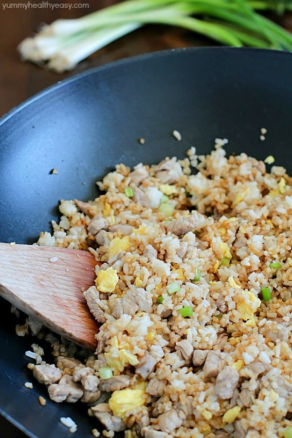 Crazy delicious family-favorite Pork Fried Rice that’s easy, has only seven simple ingredients, takes 20 minutes or less to make and will WOW any and everyone!