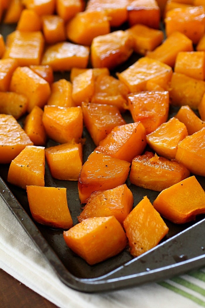 Caramelized Butternut Squash makes the tastiest side dish! It's one of the best ways to cook butternut squash and it's super easy to make! With a little sweet and a little spice, this butternut squash recipe will knock your socks off! AD