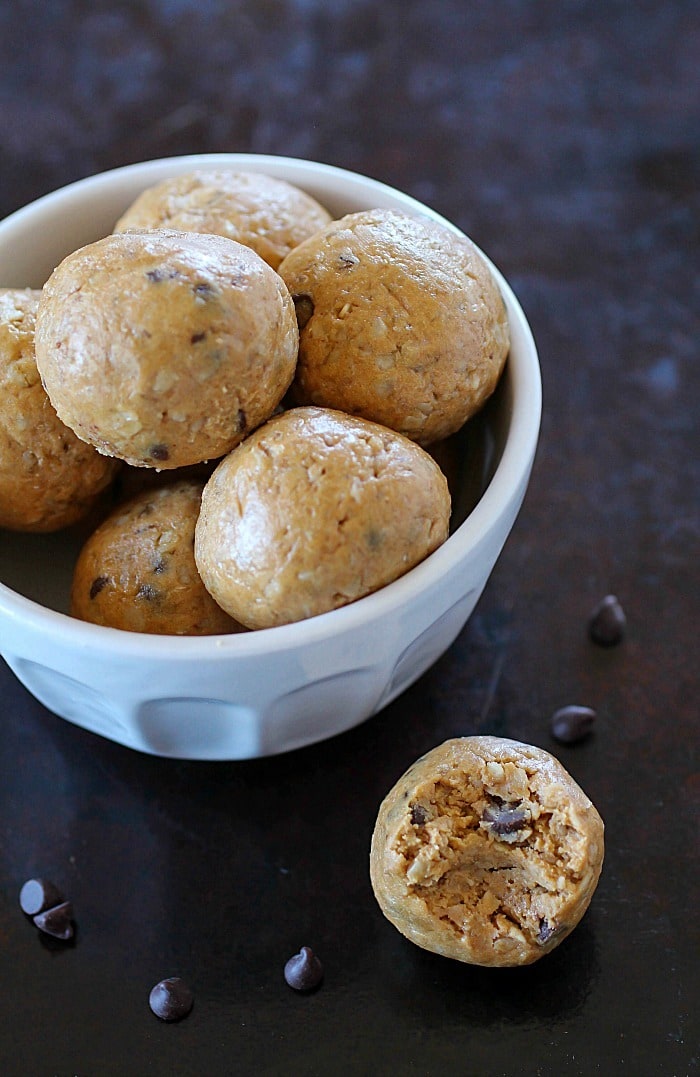 Protein balls filled with peanut butter, protein powder and oats make the most delicious on-the-go snack! Whenever you need a little protein boost to get you to the next meal, these little bites have you covered! Only 5 simple ingredients, too!