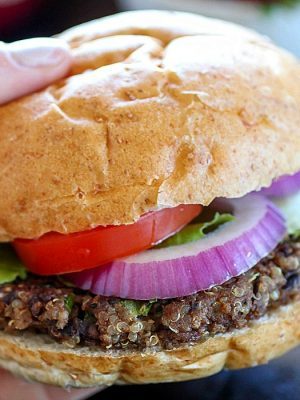 Quinoa Black Bean Burgers - meatless patties full of black beans, quinoa and spices. You won't believe these are vegetarian! The flavor is so delicious and only 270 calories per burger!