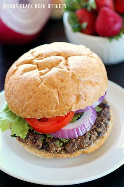 Quinoa Black Bean Burgers - meatless patties full of black beans, quinoa and spices. You won't believe these are vegetarian! The flavor is so delicious and only 270 calories per burger!