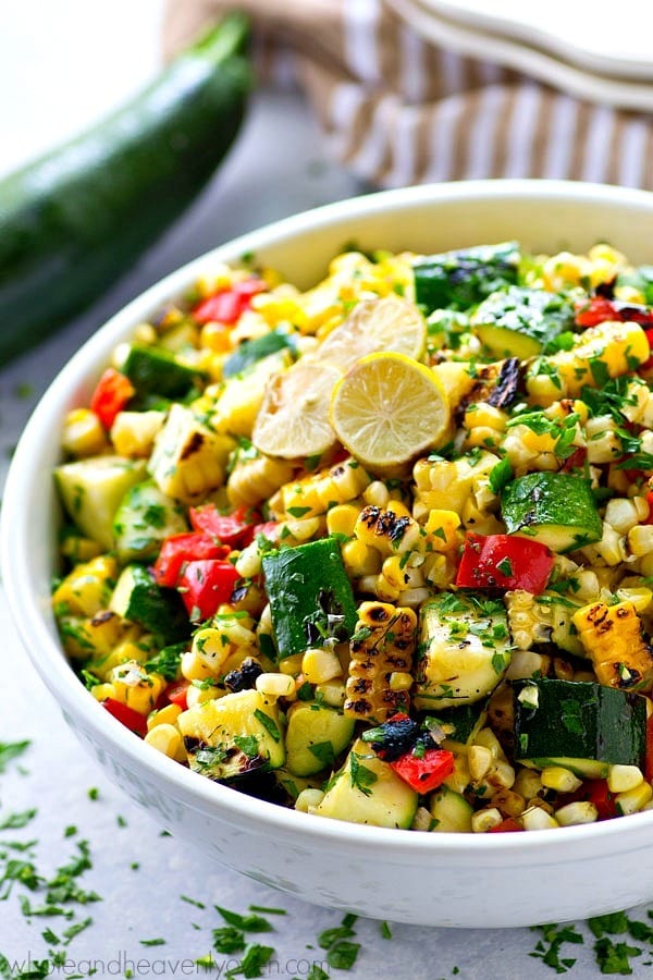 Smoky grilled zucchini, charred sweet corn, and tons of other Mexican goodness collide in this loaded Mexican salad that’s a perfect way to use up the last of the summer produce!