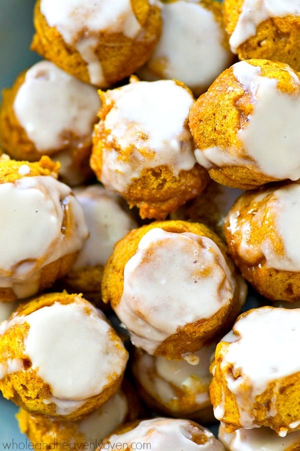 These pillow-soft Pumpkin Spice Donut Holes are covered in tons of vanilla glaze and perfect for the upcoming fall days!—So easy to mix up and only 51 calories per donut hole.