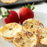 Mini Bacon Egg Muffins are healthy little breakfast bites full of yummy protein. Only 43 calories and 3 grams of protein in every mini egg muffin! They're easy to make and perfect to make ahead and grab on the go! AD