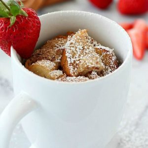 Quick & Easy Mug French Toast has all that you love about french toast but conveniently cooked right in a mug for a single serving! French Toast in a mug is such an easy breakfast for on-the-go plus it uses egg whites to save some calories. Only 170 calories and 12 grams of protein for a yummy and satisfying breakfast! AD