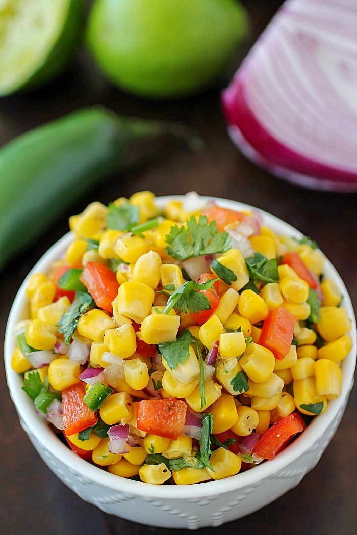 Corn Salsa recipe that's super easy to make and delicious! Using canned corn and other ingredients you probably already have on hand, this is the quickest salsa recipe & one of the most flavorful! Plus all about my Iowa Corn Quest trip! AD