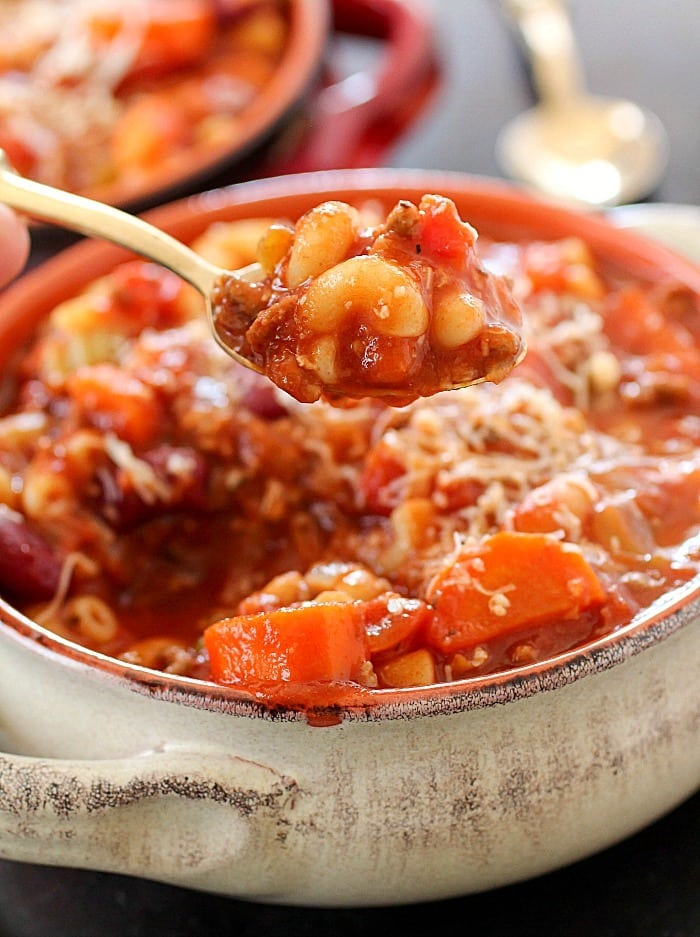 Pasta e Fagioli, which means pasta & beans in Italian, is an easy soup recipe full of beans, ground beef, a little bit of pasta and a lot of flavor! This Olive Garden copycat is a great dinner recipe for any night of the week!