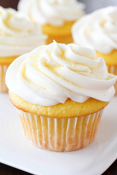 Lemon Cupcakes made with only 2 Ingredients and then frosted with a quick and easy lemon frosting! You won't believe how soft and delicious these cupcakes are! Plus a round-up of more delicious cupcake recipes you won't want to miss!
