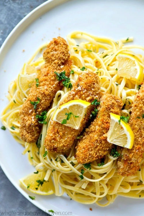 Crispy Lemon Parmesan Baked Chicken Strips and buttery herb noodles make for one unbelievably fast and easy, yet totally insanely flavorful dinner that everyone will gladly gobble up!