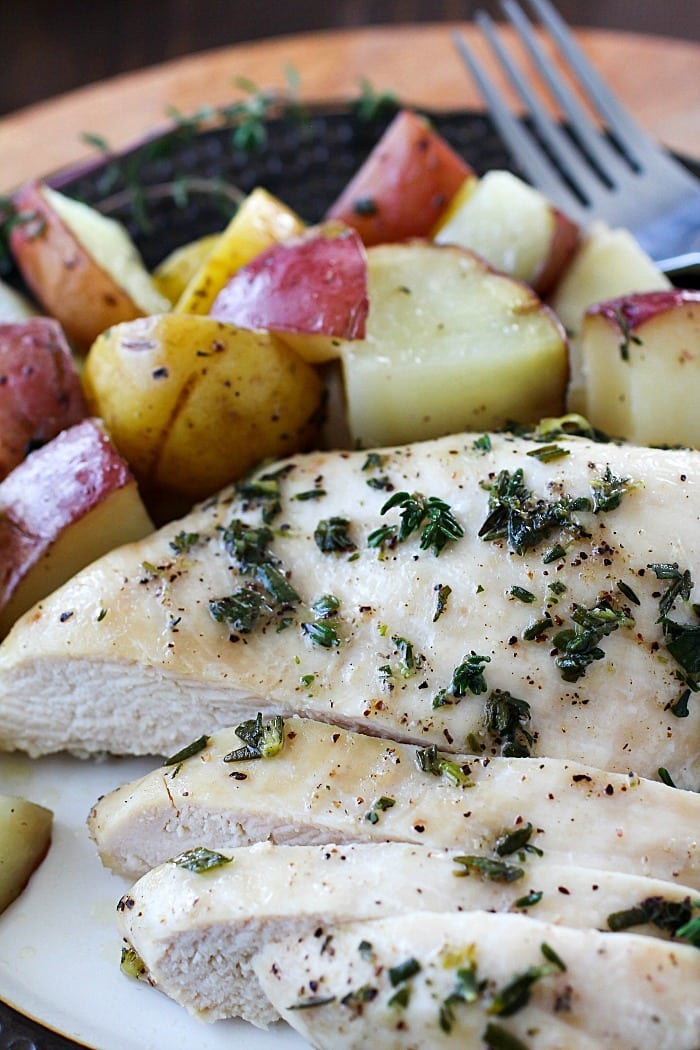 One-Pan Herb Baked Chicken and Potatoes makes making dinner a breeze! Chicken and potatoes are coated in a delicious salty herb rub and baked in one pan. The baked chicken is tender and juicy and the potatoes have so much flavor. This is an easy dinner everyone will love! AD