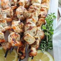 Lemon Oregano Chicken & Shrimp Skewers are marinated and then grilled for a delicious and healthy dinner recipe! Cue the hallelujah chorus! Deliciousness on a stick! This is also great for meal prepping! (high protein, paleo and clean eating)