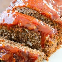 This Meatloaf Recipe is my family's FAVORITE Sunday night dinner! It really is the Best Ever Meatloaf, and it is incredibly easy to make. So much flavor packed inside with a delicious glaze spread on the top!
