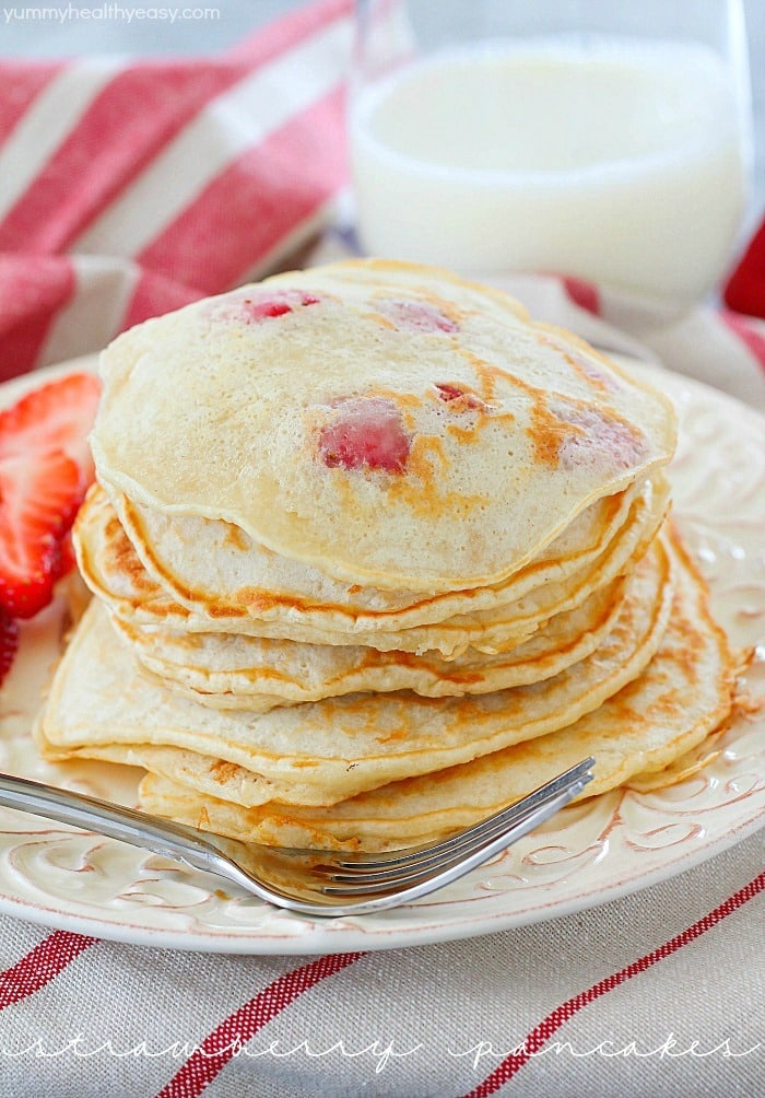 Start your day right with a stack of Strawberry Pancakes! They're a quick and easy to make breakfast the whole family will love!