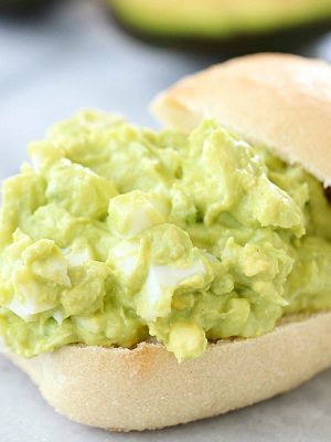 This Avocado Egg Salad is completely mayo-free and seriously tastes amazing! Imagine if guacamole and hard boiled eggs had a baby, it would be Avocado Egg Salad! This healthy recipe only takes a few minutes to whip up and is protein & fiber rich! AD