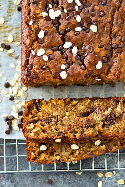 This super-moist loaded banana bread tastes like an oatmeal chocolate chip cookie and banana bread all rolled into one! Watch the entire loaf disappear before your very eyes.