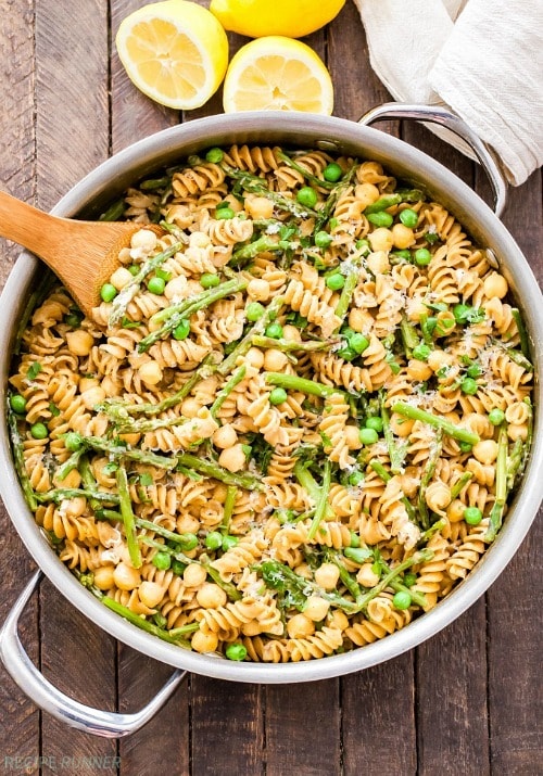 One Pot Creamy Lemon Goat Cheese Pasta with Chickpeas and Asparagus is the perfect healthy, vegetarian, comfort food dinner for weeknights! Made with whole wheat pasta, fresh lemon and asparagus, chickpeas and creamy goat cheese to tie it all together.
