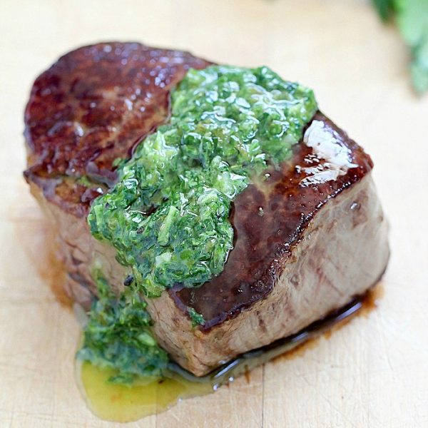 Tender Beef Medallions with the perfect crust slathered with Chimichurri Sauce